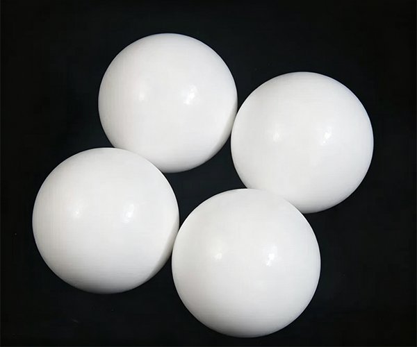 Corrosion resistant PTFE plastic balls for chemical valves and high-temperature pump components.